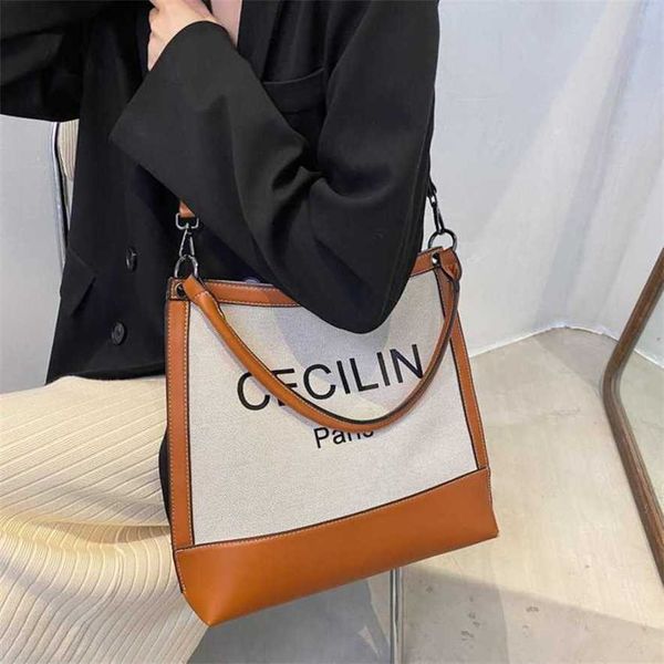 13% off 2023 handbag tote women's autumn new canvas one shoulder underarm urban minimalist fashion letter hand carrying crossbody bag
13% off 2023 handbag tote women's autumn new canvas one shoulder underarm urban minimalist fashion letter hand carrying crossbody bag