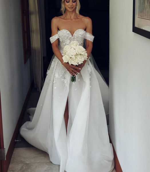elegant mermaid wedding dresses sleeveless v neck off shoulder beaded sequins appliques slit 3d lace detachable train bridal gowns plus size, White
elegant mermaid wedding dresses sleeveless v neck off shoulder beaded sequins appliques slit 3d lace detachable train bridal gowns plus size, White