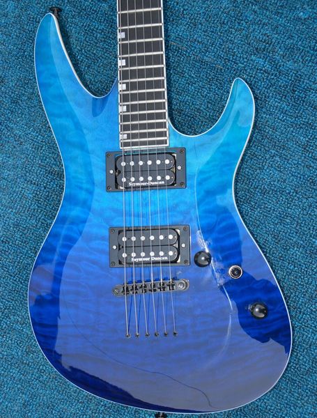 factory 6 string blue gradient electric guitar, polished and filled with maple,