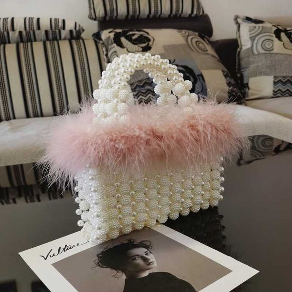 fashion female handmade pearl bucket mini tote bag woman s beaded clutch abs evening fur bags purses and handbags 230512
fashion female handmade pearl bucket mini tote bag woman s beaded clutch abs evening fur bags purses and handbags 230512