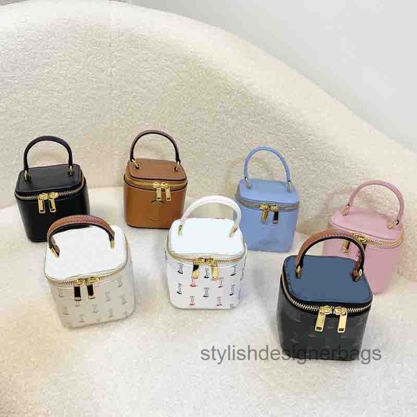 cross body vanity case mini handbag shoulder strap bags purse real leather printed canvas crossbody cosmetic totes zipped closure 
cross body vanity case mini handbag shoulder strap bags purse real leather printed canvas crossbody cosmetic totes zipped closure