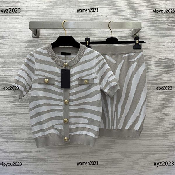 women's tracksuits designer skirt two piece dress size s-l round neck short sleeved knit and hip wrap slim skirt new arrival may07, White
women's tracksuits designer skirt two piece dress size s-l round neck short sleeved knit and hip wrap slim skirt new arrival may07, White