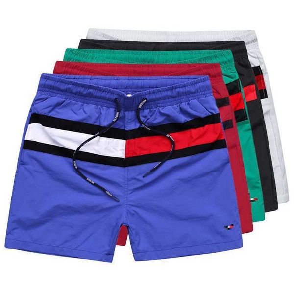 men's shorts color matching style fashion leisure sports pants outdoor rubber band beach spring and summer, White;black
men's shorts color matching style fashion leisure sports pants outdoor rubber band beach spring and summer, White;black