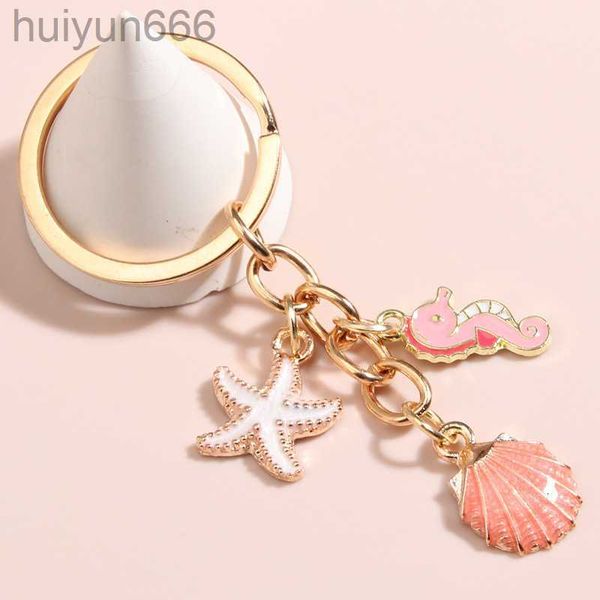 new creative shell starfish alloy oil dropping keychain pendant for girls bag pearl key chain accessories, Silver
new creative shell starfish alloy oil dropping keychain pendant for girls bag pearl key chain accessories, Silver