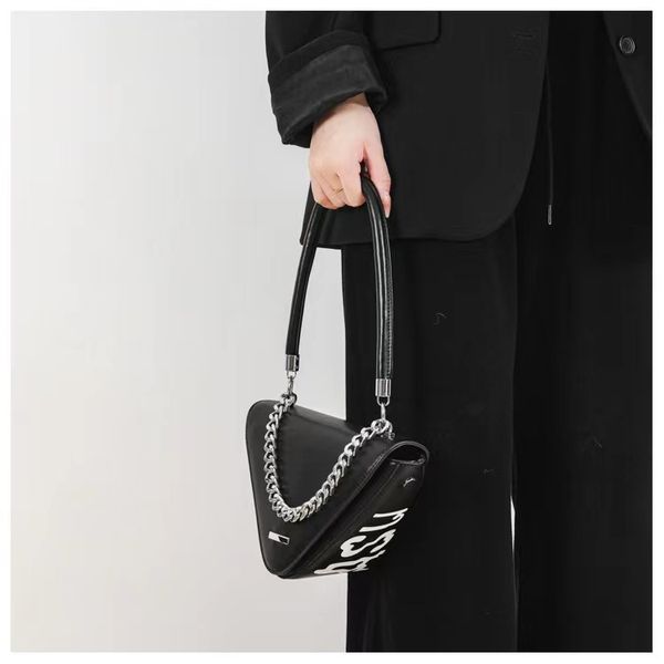 new trendy women's crossbody bag personality trend letter one-shoulder triangle handbag
new trendy women's crossbody bag personality trend letter one-shoulder triangle handbag