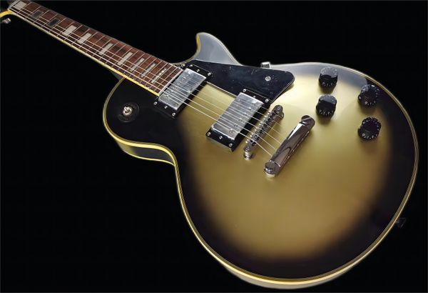 custom electric guitar, yellow logo, 60s, vintage silver and silver accessories, mahogany body,1652
custom electric guitar, yellow logo, 60s, vintage silver and silver accessories, mahogany body,1652