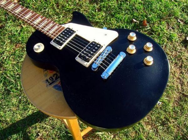 factory mahogany lp guitar studio 50's tribute satin ebony humbucking pickups baked maple electric guitar258
factory mahogany lp guitar studio 50's tribute satin ebony humbucking pickups baked maple electric guitar258