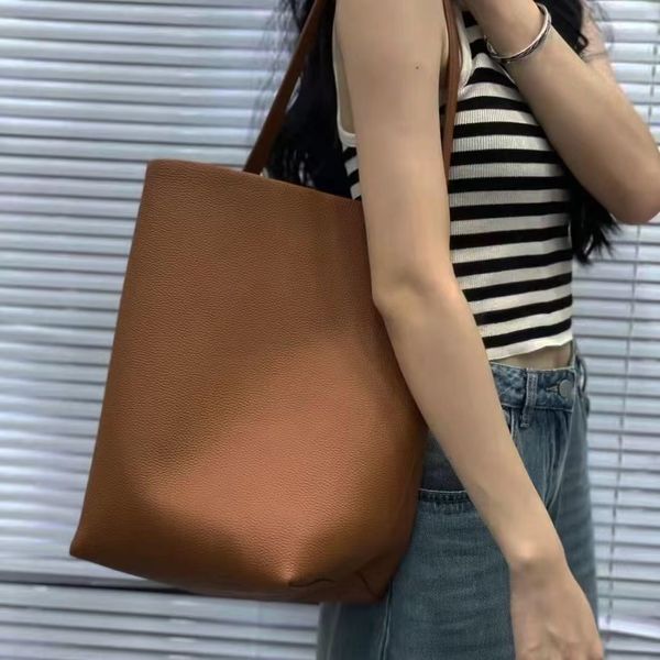 the row bag the women leather large capacity shoulder large handbag lychee grain bucket bag commuter cowhide handbag tkur
the row bag the women leather large capacity shoulder large handbag lychee grain bucket bag commuter cowhide handbag tkur