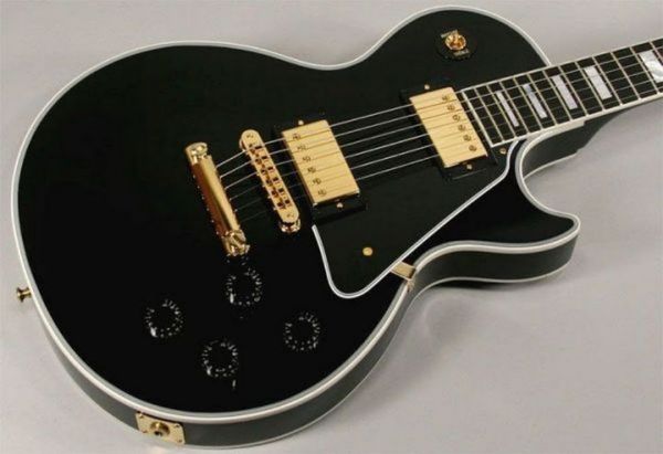 factory mahogany guitar black ebony custom with black pickgaurd electric guitar oem available258
factory mahogany guitar black ebony custom with black pickgaurd electric guitar oem available258
