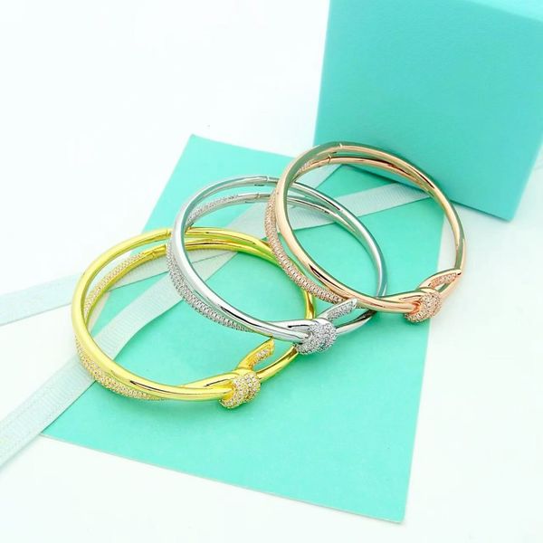 classic luxury knot bracelet, european and american designer women's bracelet, jewelry, 316l stainless steel with box, Golden;silver
classic luxury knot bracelet, european and american designer women's bracelet, jewelry, 316l stainless steel with box, Golden;silver