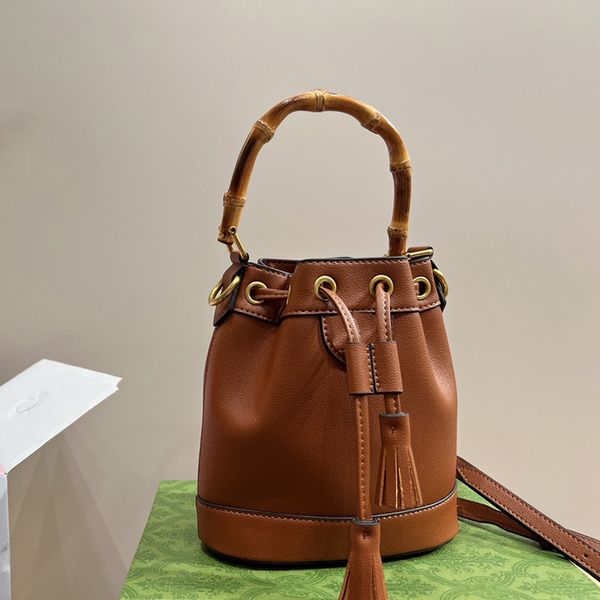 womens designer bamboo bucket bags handle totes drawstring mini purse removable leather strap crossbody shoulder handbags outdoor sacoche pu
womens designer bamboo bucket bags handle totes drawstring mini purse removable leather strap crossbody shoulder handbags outdoor sacoche pu
