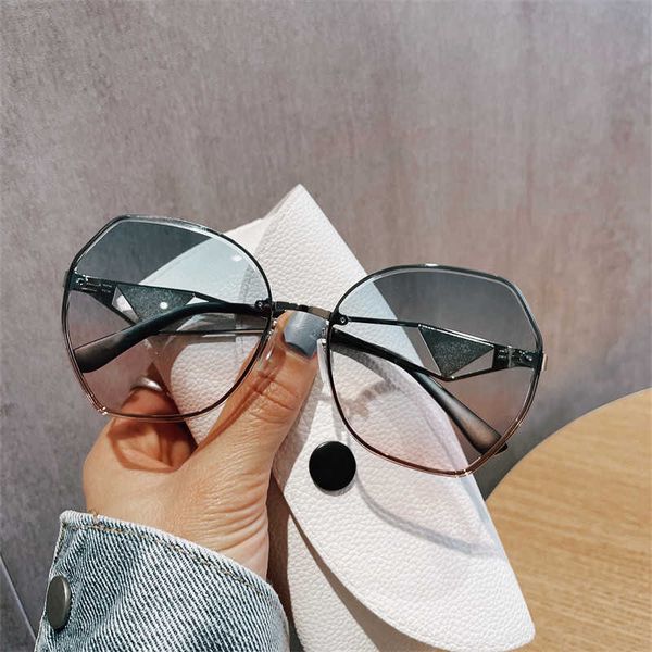 

Designer Triangular signature cool sunglasses luxury Super high quality New with Triangle Label INS Hollow Legs Personalized Small Frame Fashion Glasses