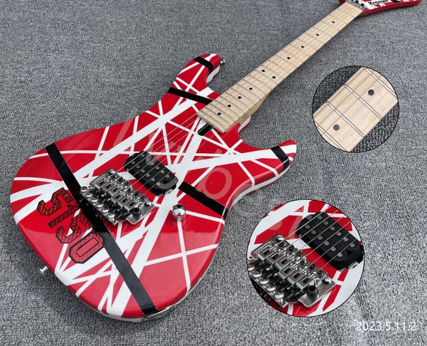 electric guitar red solid basic color white and black strips black open pole single bridge pickup floyd rose style tremolo maple neck and fi
electric guitar red solid basic color white and black strips black open pole single bridge pickup floyd rose style tremolo maple neck and fi