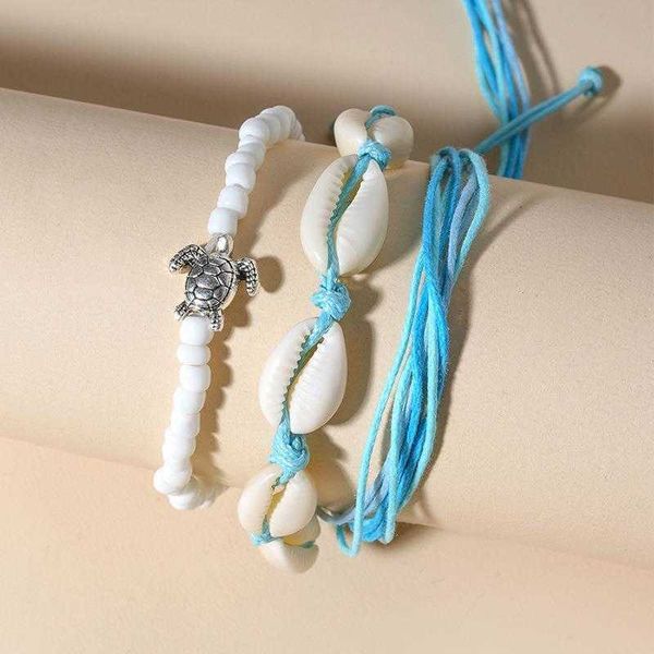 handmade white charm rice shaped beads stringed braid rope shell blue cord woven turtle bracelet for women, Golden;silver
handmade white charm rice shaped beads stringed braid rope shell blue cord woven turtle bracelet for women, Golden;silver
