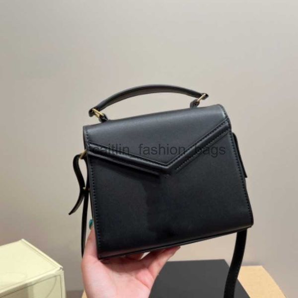 cross body cassandra medium handle bag in grain de poudre embossed leather designer flap pivoting closure handbag metal hardware totes luxur
cross body cassandra medium handle bag in grain de poudre embossed leather designer flap pivoting closure handbag metal hardware totes luxur