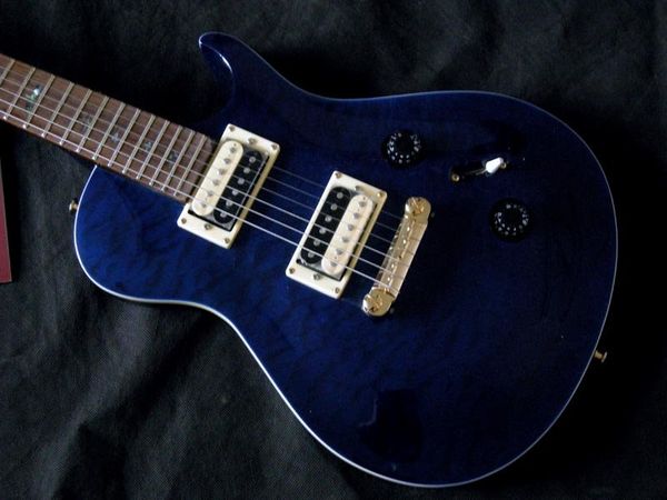 blue electric guitar one wearing a string bridge birds inlay fingerboard prs artist series1685
blue electric guitar one wearing a string bridge birds inlay fingerboard prs artist series1685