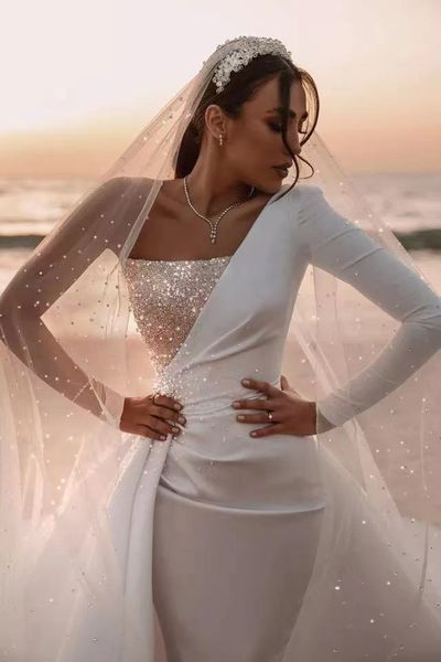 luxury satin white mermaid wedding dresses boat neck one shoulder long sleeve shiny sequin chapel wedding bridal gowns
luxury satin white mermaid wedding dresses boat neck one shoulder long sleeve shiny sequin chapel wedding bridal gowns