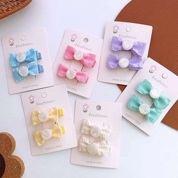 1 pair new children's cute candy color fabric pearl bow hair clip headwear korean sweet girl princess hairpins hair accessories, Slivery;white
1 pair new children's cute candy color fabric pearl bow hair clip headwear korean sweet girl princess hairpins hair accessories, Slivery;white
