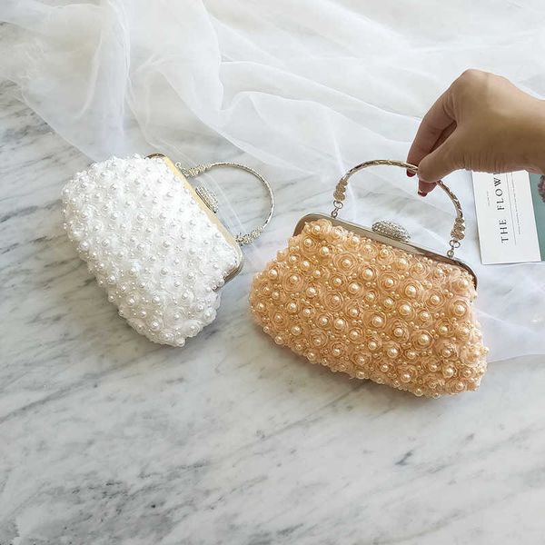 evening bags pearl women flower rose party handbags diamonds metal day clutch wedding female new design purse 230427
evening bags pearl women flower rose party handbags diamonds metal day clutch wedding female new design purse 230427