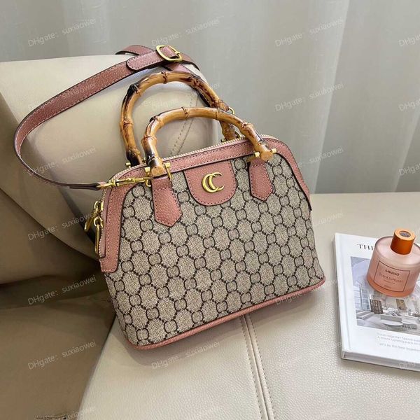 luxury women shell bag fashion designer bamboo handle handbag classic pu leather womens one shoulder oblique span purse men business bags
luxury women shell bag fashion designer bamboo handle handbag classic pu leather womens one shoulder oblique span purse men business bags