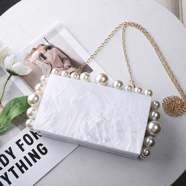 autumn new acrylic evening bag white pearl women's bag small square bag fashion one shoulder messenger bag 230516
autumn new acrylic evening bag white pearl women's bag small square bag fashion one shoulder messenger bag 230516