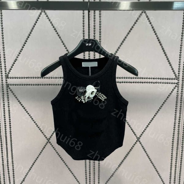23ss camis womens designer clothing vest camis tank womens tanks heavy industry nail drill pearl camellia logo knitted vest irregular hem wo, White
23ss camis womens designer clothing vest camis tank womens tanks heavy industry nail drill pearl camellia logo knitted vest irregular hem wo, White