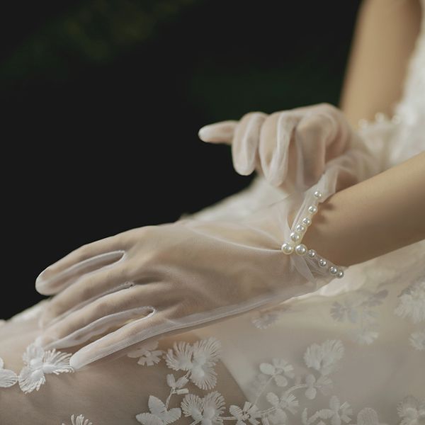 st-0009-a new wedding gloves short white tulle handmade beaded wedding bride elegant retro five finger gloves performance
st-0009-a new wedding gloves short white tulle handmade beaded wedding bride elegant retro five finger gloves performance