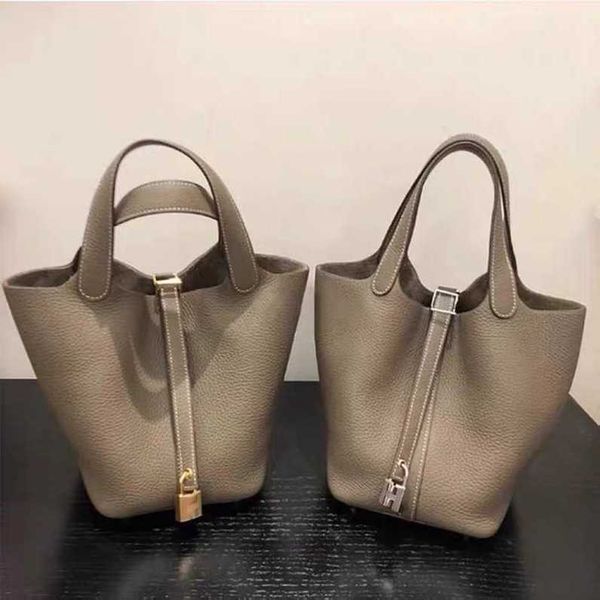 a designer tote bag her mas handbag authentic picotin bags h family vegetable basket bag leather womens bag versatile bucket large capacity
a designer tote bag her mas handbag authentic picotin bags h family vegetable basket bag leather womens bag versatile bucket large capacity