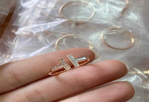 v gold material mi plated natural white fritillaria with diamond double t ring opening versatile fashion style8875337, Silver
v gold material mi plated natural white fritillaria with diamond double t ring opening versatile fashion style8875337, Silver