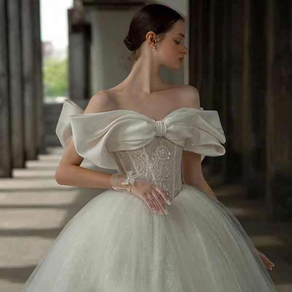 luxury wedding dress boat neck bow lace sequins applique beaded shiny crystal off shoulder style french court train bridal gowns, White
luxury wedding dress boat neck bow lace sequins applique beaded shiny crystal off shoulder style french court train bridal gowns, White