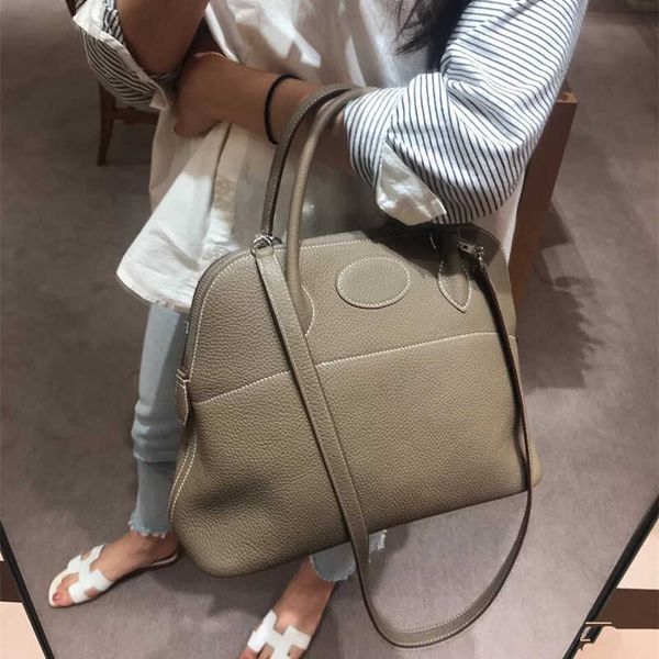 designer no box new style bowling bag baolai bag togo lychee grain head layer cow leather portable one shoulder slanting shell bag women
designer no box new style bowling bag baolai bag togo lychee grain head layer cow leather portable one shoulder slanting shell bag women