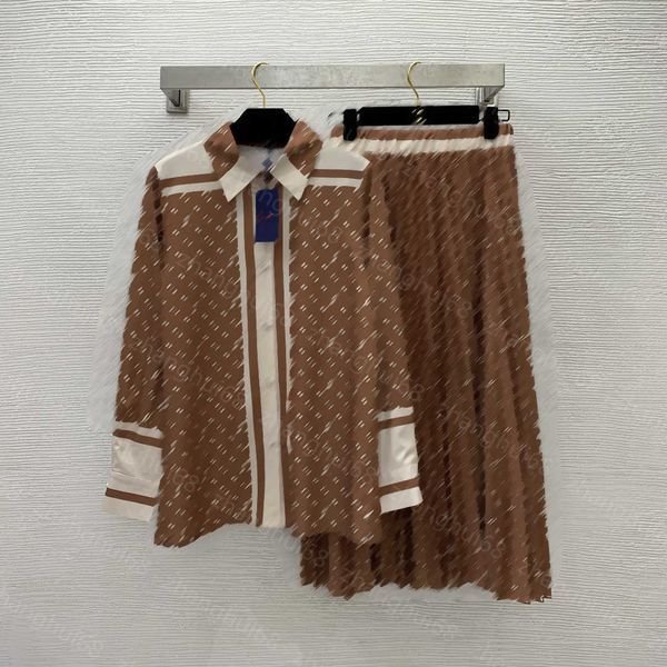 23ss womens designer clothing skirt set logo printed lapel color combination long-sleeved shirt elastic waist slimming long half skirt sets, White
23ss womens designer clothing skirt set logo printed lapel color combination long-sleeved shirt elastic waist slimming long half skirt sets, White