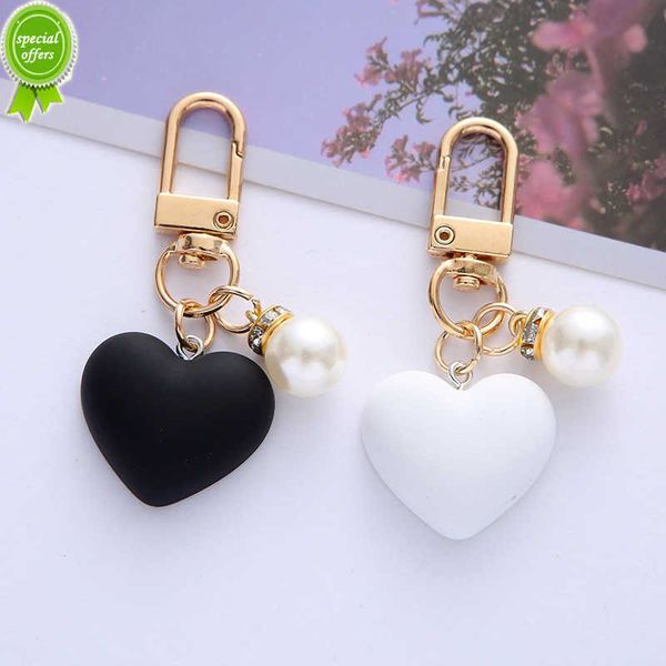 new black white frosted heart keychain with pearl charms trendy headphone case bag ornaments for couples friendship gift accessories
new black white frosted heart keychain with pearl charms trendy headphone case bag ornaments for couples friendship gift accessories