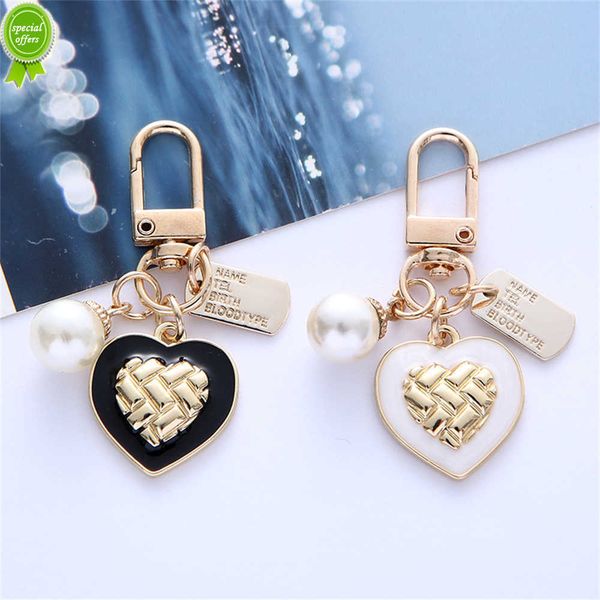 new creative pearl peach heart keychain elegant letter label imitation pendant for women girls handbag headphone case accessorie
new creative pearl peach heart keychain elegant letter label imitation pendant for women girls handbag headphone case accessorie