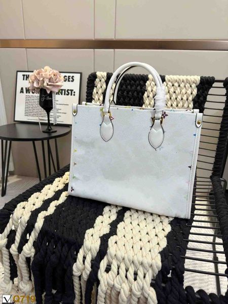 

23ss luxurys designers women onthego totes shopping bags white colour handbag shouder crossbody bag genuine leather ladies on the go handbag
