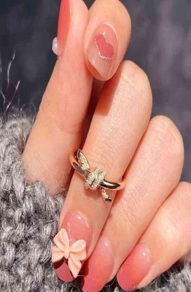 new ring female sterling silver knot minority design high sense rose gold fashion simple personality index finger does not fade5730241
new ring female sterling silver knot minority design high sense rose gold fashion simple personality index finger does not fade5730241