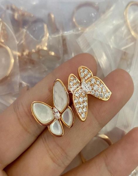 new v gold material butterfly mother of shell and zircons open ring fashion brand ring for women bijoux femme2063688, Silver
new v gold material butterfly mother of shell and zircons open ring fashion brand ring for women bijoux femme2063688, Silver