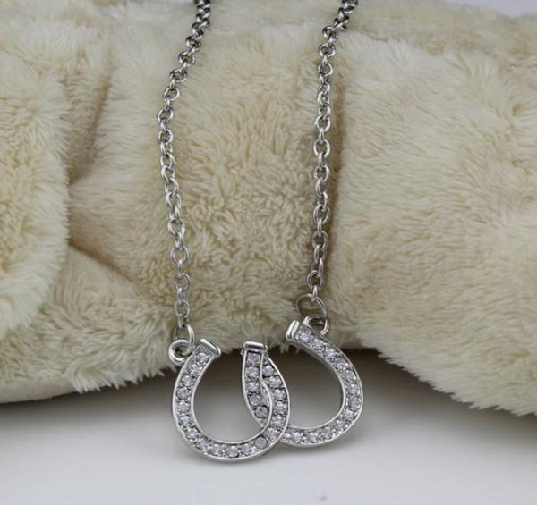 lead and nickel jewellery double horse shoe pendant necklace equestrian horseshoe jewelry decorated with white czech crystal8265180, Silver
lead and nickel jewellery double horse shoe pendant necklace equestrian horseshoe jewelry decorated with white czech crystal8265180, Silver