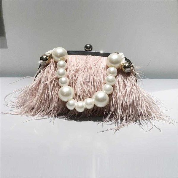 shoulder bags luxury brand handle 2023 fashion female wallet retro lux new temperament feathers pearl chain crossbody clutch 230426
shoulder bags luxury brand handle 2023 fashion female wallet retro lux new temperament feathers pearl chain crossbody clutch 230426
