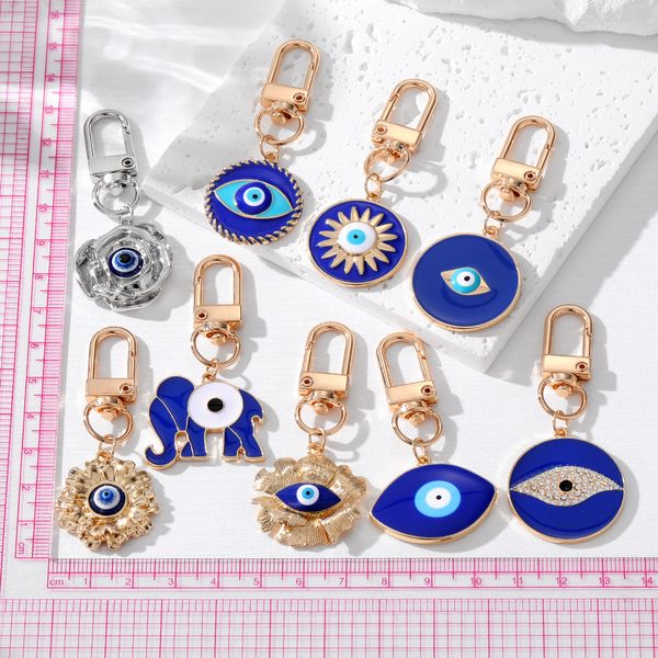 popular dark blue evil eye keychain pendant diamond set devil's eye elephant flower bag car keychain jewelry accessories, Silver
popular dark blue evil eye keychain pendant diamond set devil's eye elephant flower bag car keychain jewelry accessories, Silver