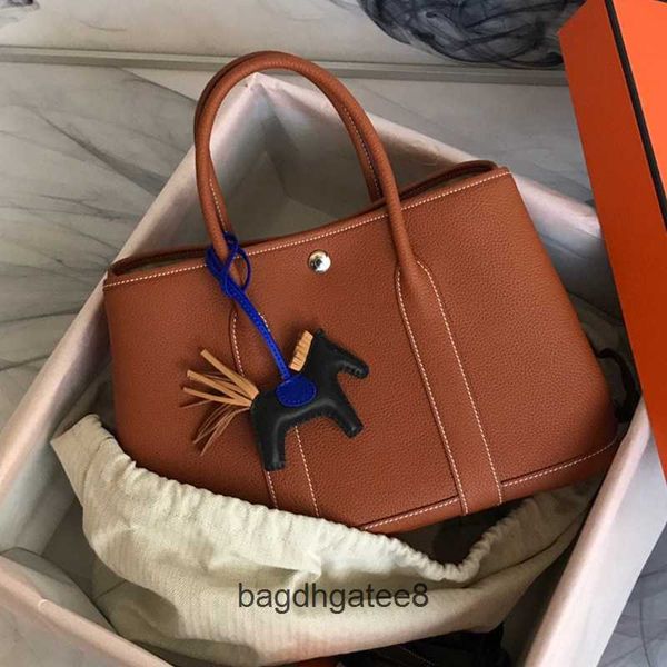 party 2023 handmade real handbag bags designer leather genuine tote totes wax line bag togo cowhide garden party leisure women's handba
party 2023 handmade real handbag bags designer leather genuine tote totes wax line bag togo cowhide garden party leisure women's handba