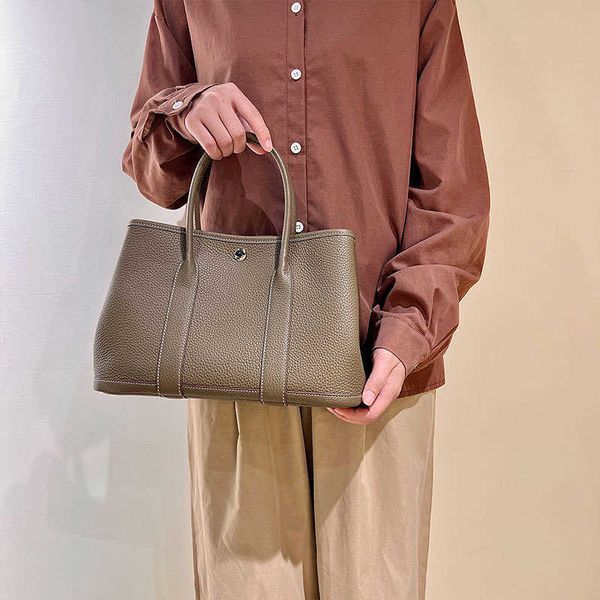 tote authentic handbag bag designer garden party genuine leather tc cowhide commuter fashion versatile women's
tote authentic handbag bag designer garden party genuine leather tc cowhide commuter fashion versatile women's