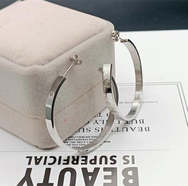 gold silver hoop charm earrings women european and american style designer letter c luxury screw pattern classic wedding anniversa1090474, Golden
gold silver hoop charm earrings women european and american style designer letter c luxury screw pattern classic wedding anniversa1090474, Golden