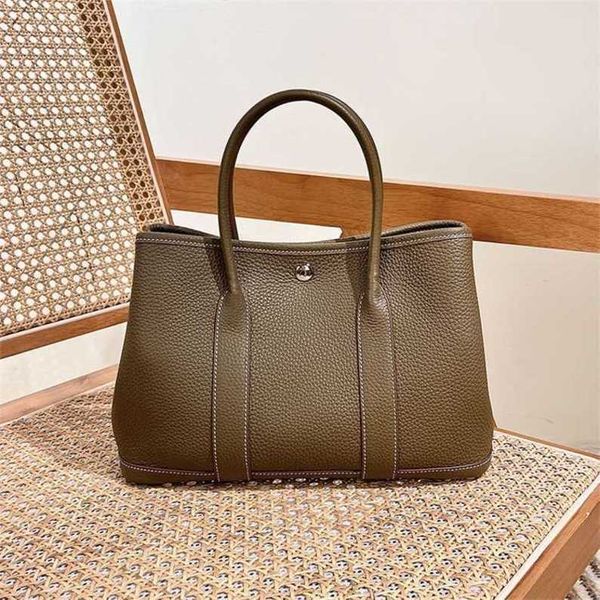 authentic handbag designer garden party tote bag party genuine leather tote bag tc cowhide commuter fashion versatile women's bag
authentic handbag designer garden party tote bag party genuine leather tote bag tc cowhide commuter fashion versatile women's bag