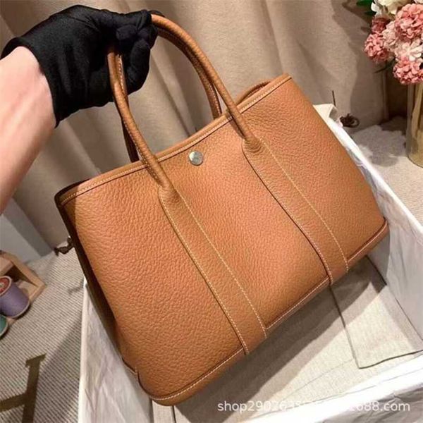 authentic handbag designer garden party tote bag pure handmade wax thread bag negonda leather 30cm large capacity mommy togo pitot bag porta
authentic handbag designer garden party tote bag pure handmade wax thread bag negonda leather 30cm large capacity mommy togo pitot bag porta