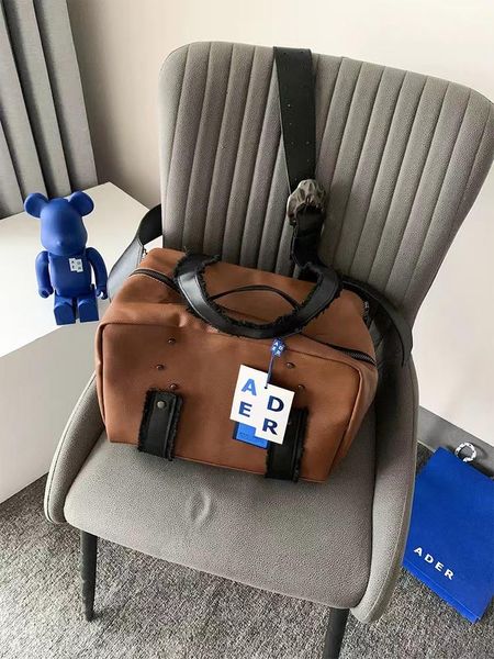 boxes ader error new highquality cowhide diagonal bag men and women torn label messenger bag fashion leisure travel shoulder bag, Black;white
boxes ader error new highquality cowhide diagonal bag men and women torn label messenger bag fashion leisure travel shoulder bag, Black;white