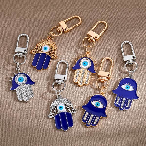 creative ethnic hand of fatima keychain pendant blue devil's eye alloy hollow jewelry car bag keychains accessories, Silver
creative ethnic hand of fatima keychain pendant blue devil's eye alloy hollow jewelry car bag keychains accessories, Silver