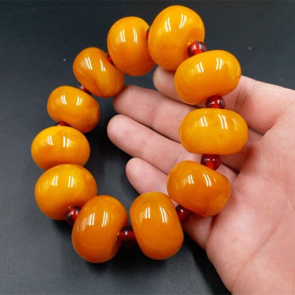 bangle natural genuine golden twisted honey unoptimized rough old beeswax amber barrel beaded bracelet, Black
bangle natural genuine golden twisted honey unoptimized rough old beeswax amber barrel beaded bracelet, Black