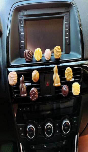 creative simulation chocolate car perfume air freshener plastic candy model cute car accessories interior woman auto vent clip1355026
creative simulation chocolate car perfume air freshener plastic candy model cute car accessories interior woman auto vent clip1355026
