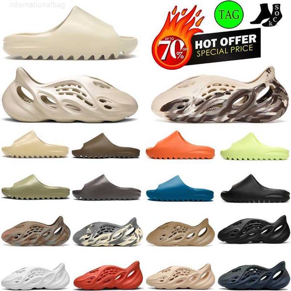 2023 mens slide women designer slides slippers foam runner sandals desert sand earth brown onyx triple white black mxt moon gray outdoor sli
2023 mens slide women designer slides slippers foam runner sandals desert sand earth brown onyx triple white black mxt moon gray outdoor sli
